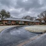Texas asphalt driveway affected by January frost and winter rain